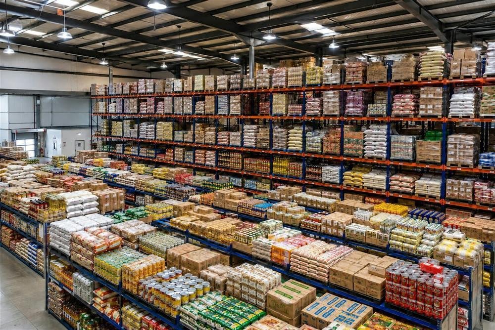 Warehouse racking stocked with packaged goods
